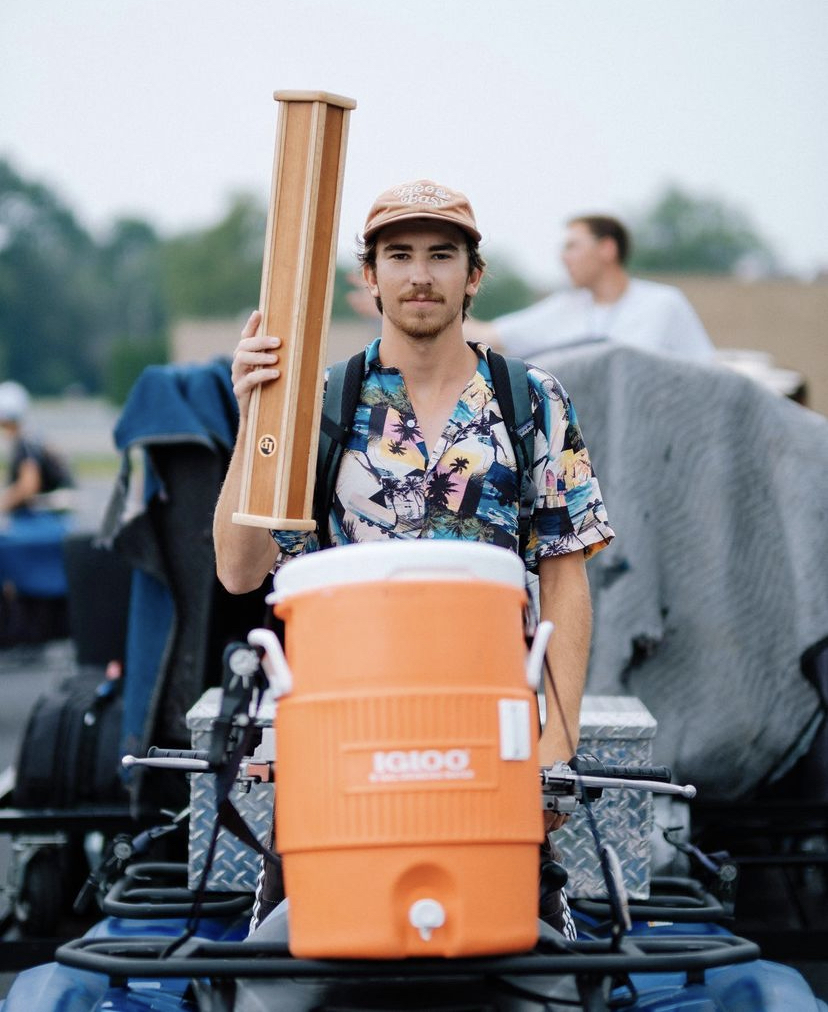Image of Dudley holding a rainstick